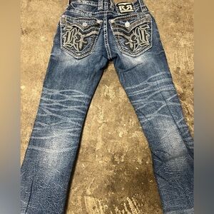 Rock Revival jeans, cuts on the bottom sides to make it flare more!.